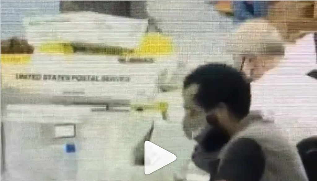 Screenshot of a video of an elections worker in Atlanta.