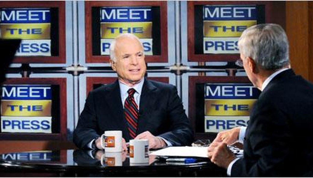 Sen. John McCain speaking with Tom Brokaw, host of “Meet the Press,” in Waterloo, Iowa, in 2008. (Getty Images)