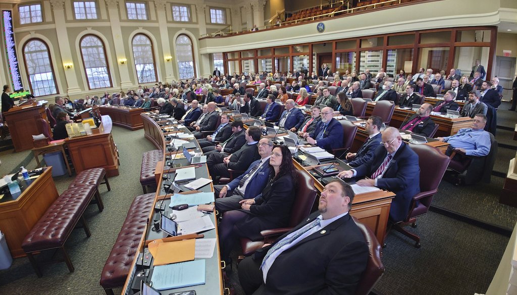 House representatives look up to see how their colleagues voted on a heating assistance package, Jan. 4, 2023, at the State House in Augusta, Maine. (AP)