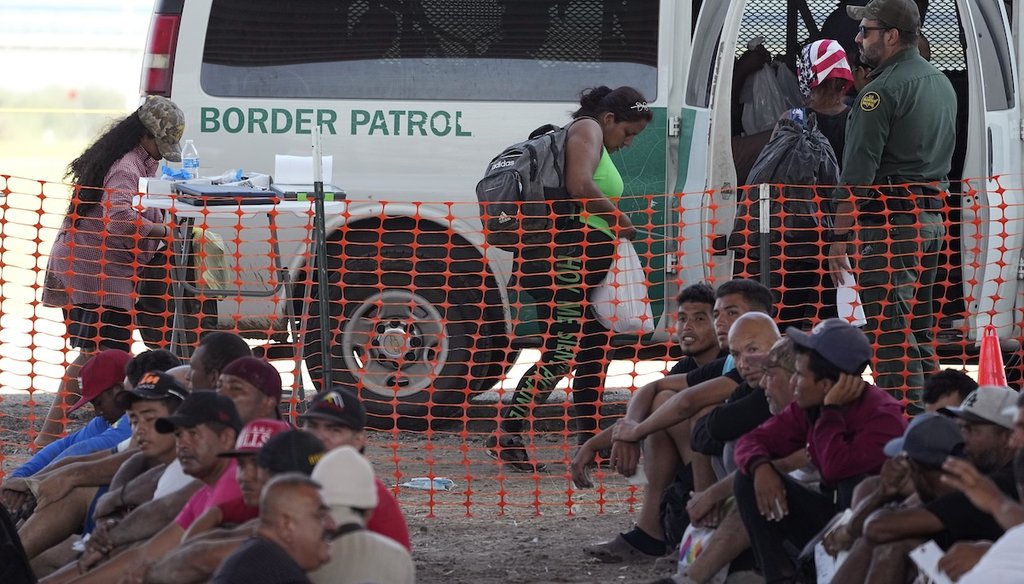 Migrants who crossed the Rio Grande river in the U.S. from Mexico are held and bussed from a make-shift processing center, Sept. 22, 2023, in Eagle Pass, Texas. (AP)