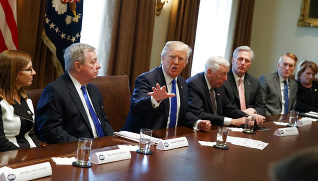 President Donald Trump speaks during a meeting with lawmakers on immigration policy in the Cabinet Room of the White House, Tuesday, Jan. 9, 2018, in Washington. (AP Photo/Evan Vucci)