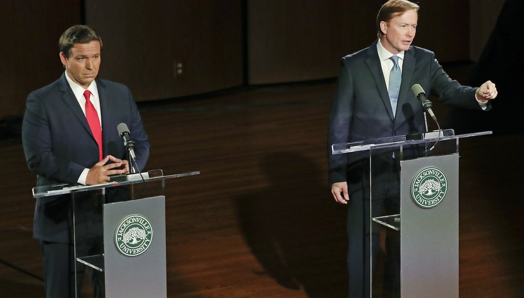 Republican gubernatorial candidates Ron DeSantis, left, and Adam Putnam debate Aug. 8, 2018, in Jacksonville, Fla. (AP Photo/John Raoux)