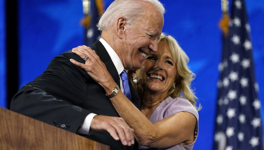 Democratic presidential candidate and former Vice President Joe Biden hugs his wife, Jill Biden, after his speech during the fourth day of the Democratic National Convention, Thursday, Aug. 20, 2020, at the Chase Center in Wilmington, Del. (AP)