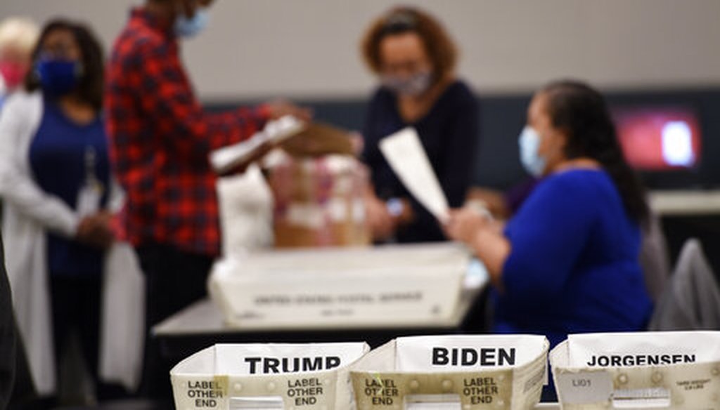 Cobb County election officials sort ballots during an audit, Nov. 13, 2020, in Marietta, Ga. (AP)