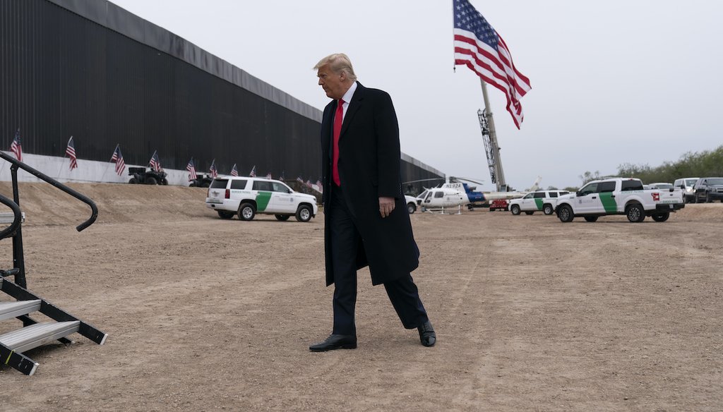 President Donald Trump near a section of the U.S.-Mexico border construction, Jan. 12, 2021, in Alamo, Texas. (AP)