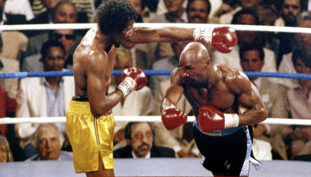 Boxers Thomas "Hitman" Hearns (left) and Marvelous Marvin Hagler fought outdoors at Caesars Palace in Las Vegas on April 15, 1985, for Hagler's middleweight title. Hagler won by technical knockout. He died at age 66 on March 13, 2021. (AP)