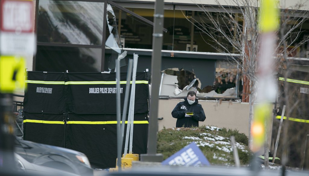 Police work on the scene outside of a King Soopers grocery store where authorities say multiple people were killed in a shooting on March 22, 2021, in Boulder, Colo. (AP)