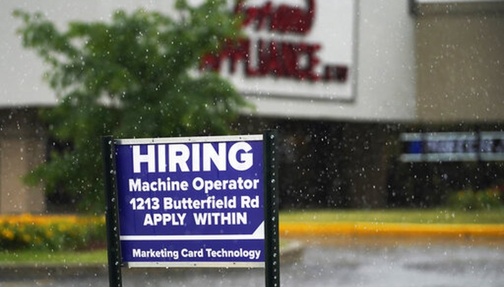 A hiring sign in Downers Grove, Ill. (AP)