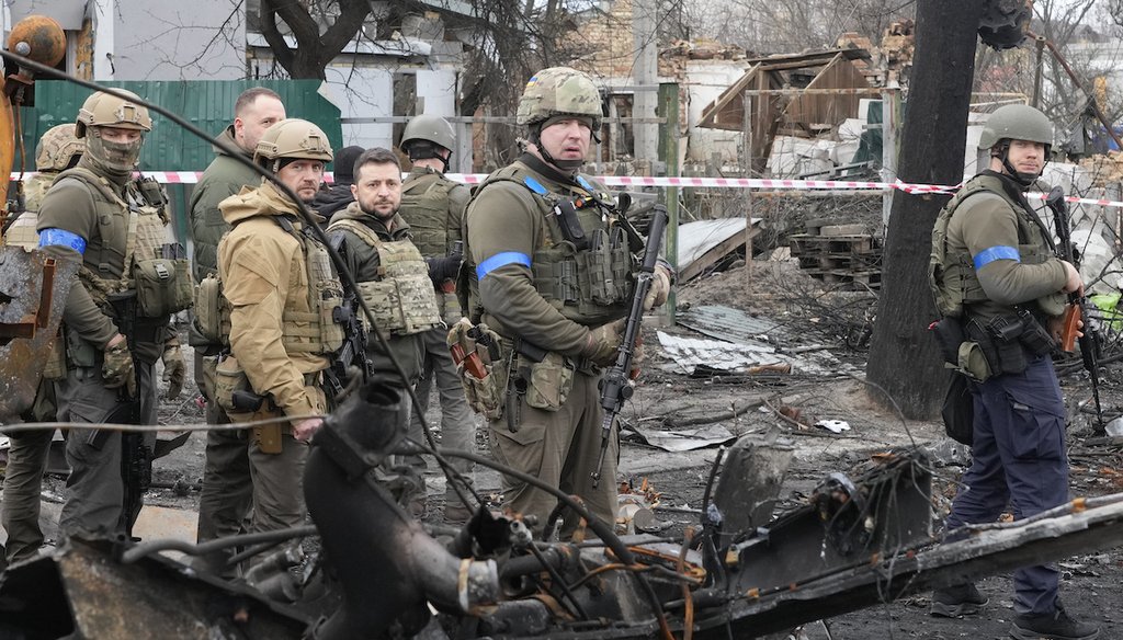 Ukrainian President Volodymyr Zelenskyy examines wreckage in Bucha, close to Kyiv, Ukraine, on Apr. 4, 2022. (AP)