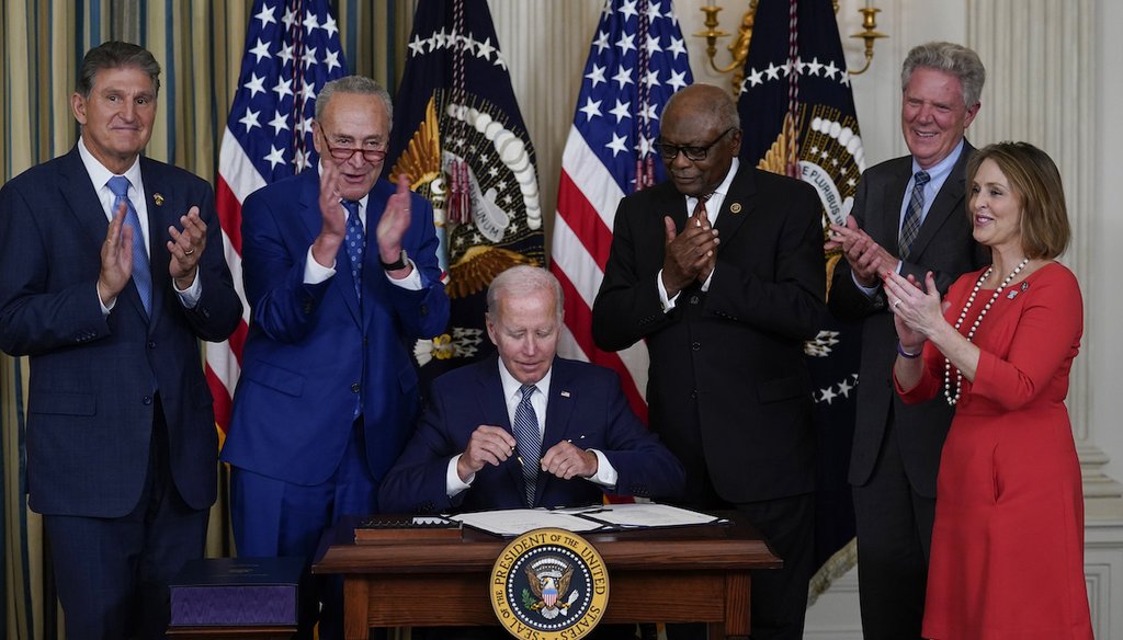 President Joe Biden signs the Democrats' landmark climate change and health care bill Aug. 16, 2022. Republicans are critical of money for the IRS in the bill. (AP)
