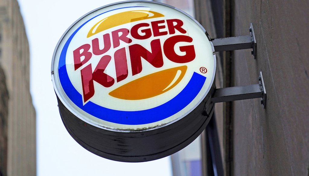 The Burger King logo is displayed on a sign outside a restaurant in downtown Pittsburgh on Jan. 12, 2022.