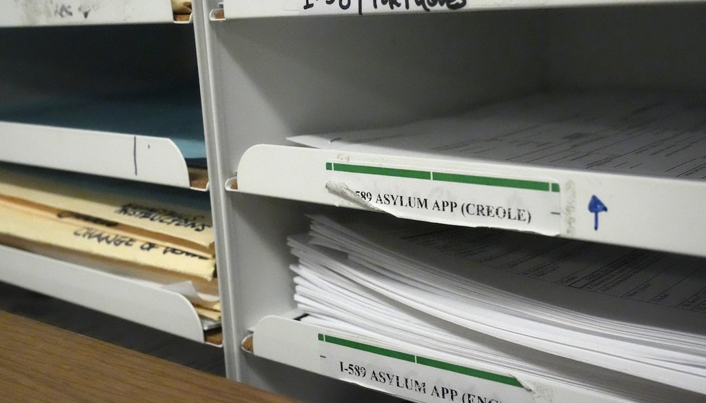 Asylum applications in different languages are shown, Jan. 10, 2024, in a room used by Catholic Legal Services for the Archdiocese of Miami to help asylum seekers at an immigration court in Miami. (AP)