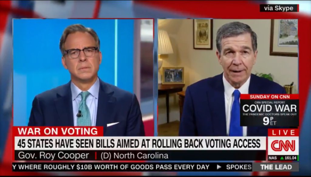 North Carolina Gov. Roy Cooper speaks to CNN's Jake Tapper in March 2021.