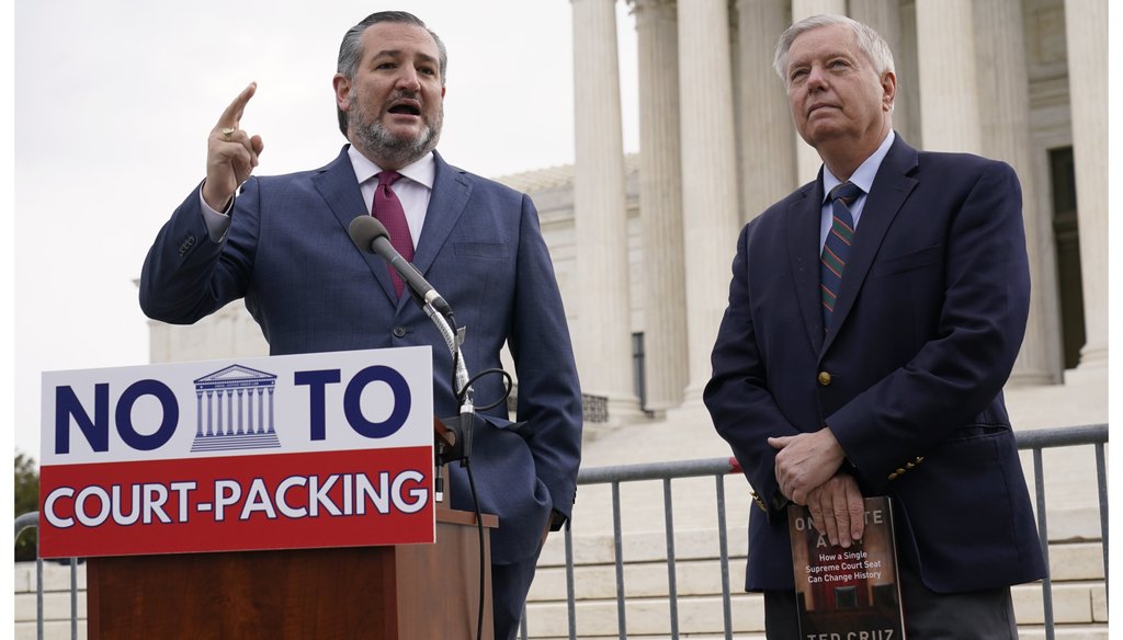 Sen. Ted Cruz, R-Texas, left, speaks as Sen. Lindsey Graham, R-S.C., right, listens during a news conference outside the Supreme Court in Washington, Thursday, April 22, 2021. (AP Photo/Susan Walsh)