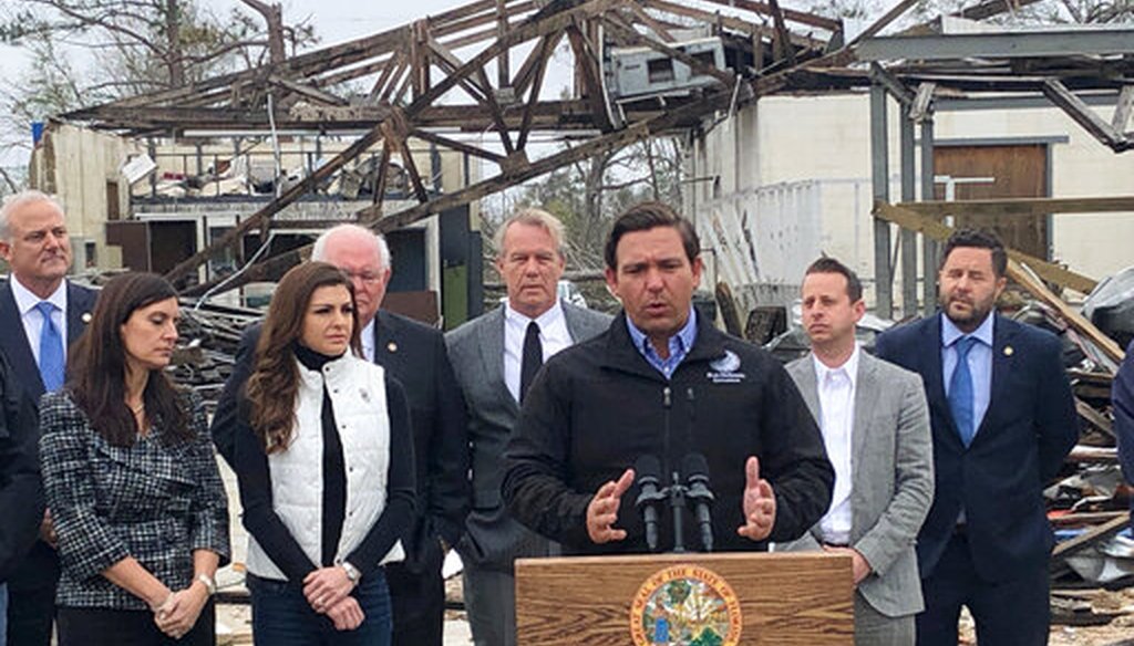 Florida Gov. Ron DeSantis announces that President Donald Trump is committing hundreds of millions of dollars in extra money to reimburse the state for Hurricane Michael cleanup Thursday, Jan. 24, 2019, in Marianna, Fla. (AP)