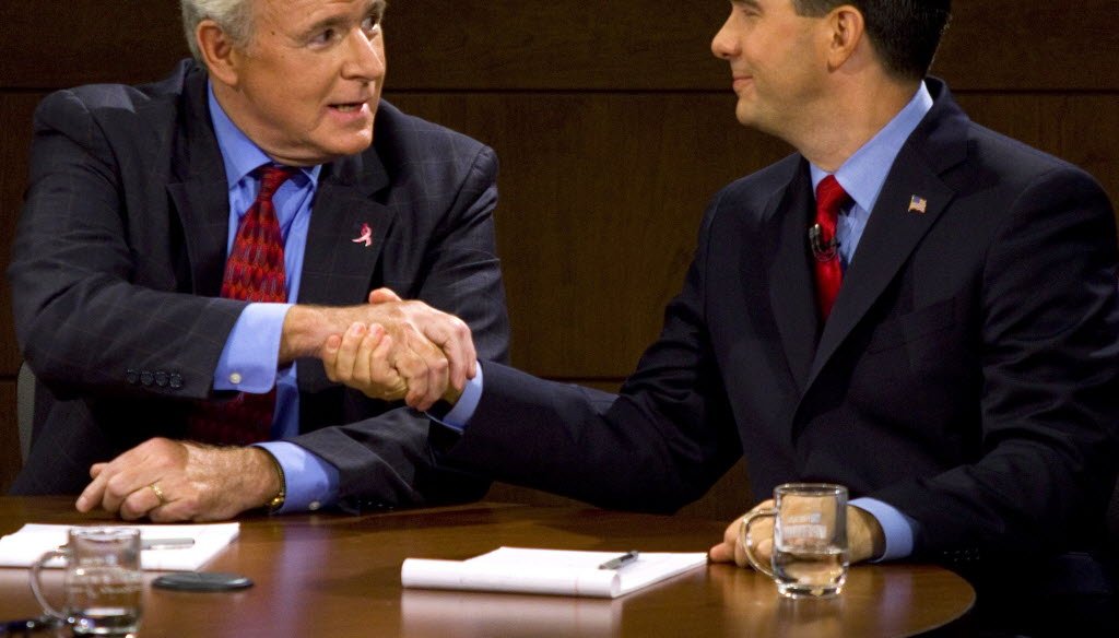 Democrat Tom Barrett and Republican Scott Walker at a recent debate