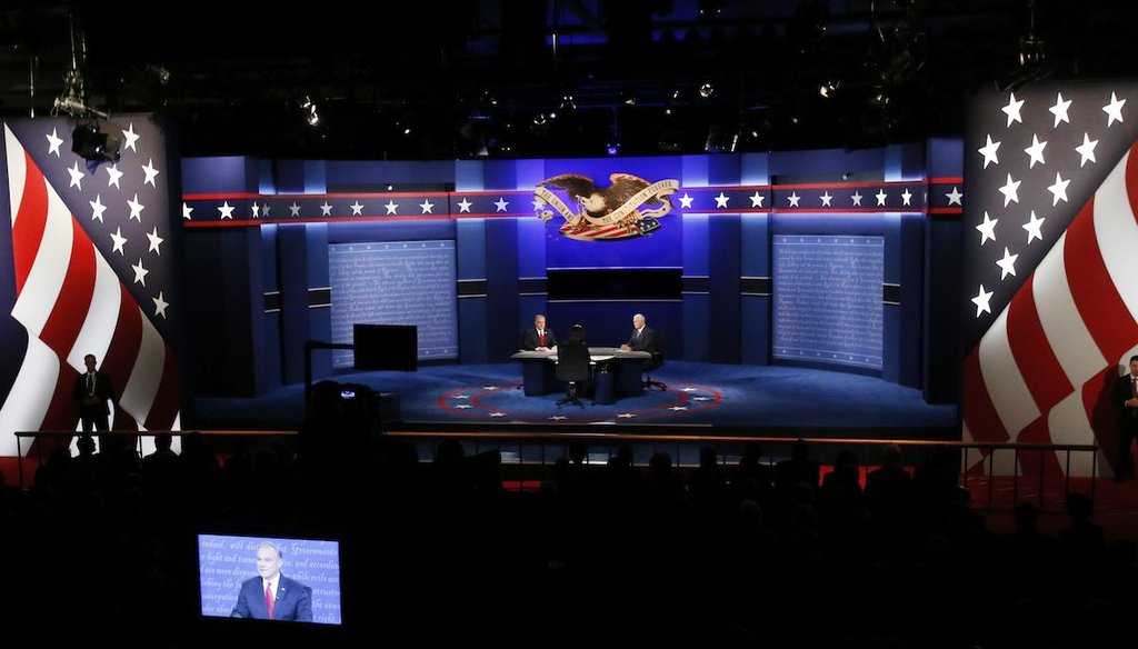 Republican vice-presidential nominee Gov. Mike Pence, right and Democratic vice-presidential nominee Sen. Tim Kaine debate during the vice-presidential debate at Longwood University in Farmville, Va., Tuesday, Oct. 4, 2016. (AP Photo/Steve Helber)