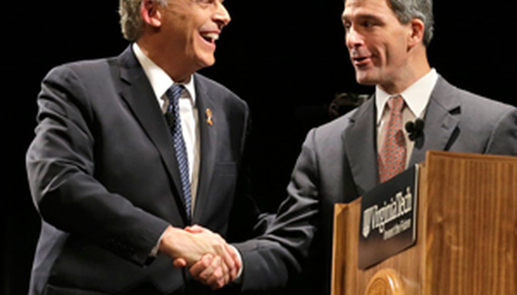 Democrat Terry McAuliffe, left, and Republican Ken Cuccinelli shake hands before their final debate in the Nov. 5 gubernatorial election. Photo by AP.