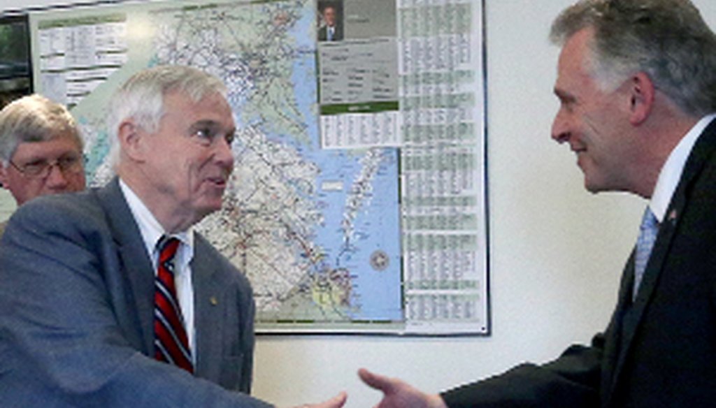 House Speaker Bill Howell, left, shakes hands with Gov. Terry McAuliffe before a recent meeting on the budget impasse. Behind Howell is Secretary of Finance Ric Brown.   