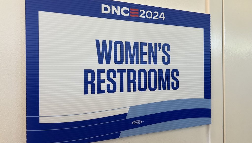 A sign designates a women's restroom near the press filing area in the Advocate Center, part of the  Chicago complex where the 2024 Democratic National Convention is held. Claims the DNC has no women's rooms are wrong. (Maria Ramirez Uribe/PolitiFact)