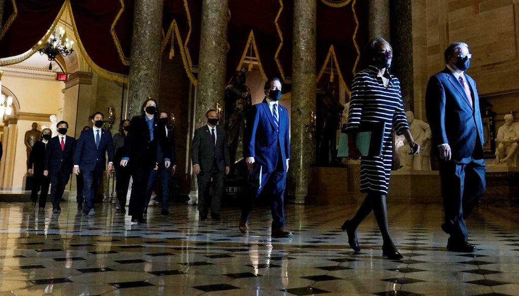 Democratic House impeachment managers walk through Statuary Hall in the Capitol to deliver to the Senate an article of impeachment against former President Donald Trump on Jan. 25, 2021. (AP)