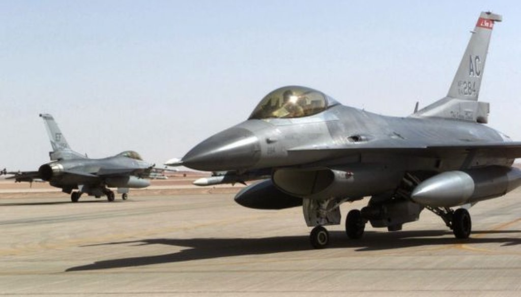 Force F-16 Falcons from the New Jersey Air National Guard are armed at Prince Sultan Air Base in Saudi Arabia while enforcing the no-fly zone in southern Iraq in 2000. (US Air Force)