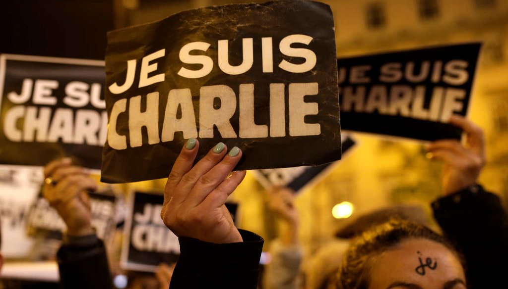 From Lisbon (pictured) to Bangkok, tens of thousands rallied to defend the freedom of expression and honor the victims of a Paris newspaper attack. The placards read in French: "I am Charlie." (AP)