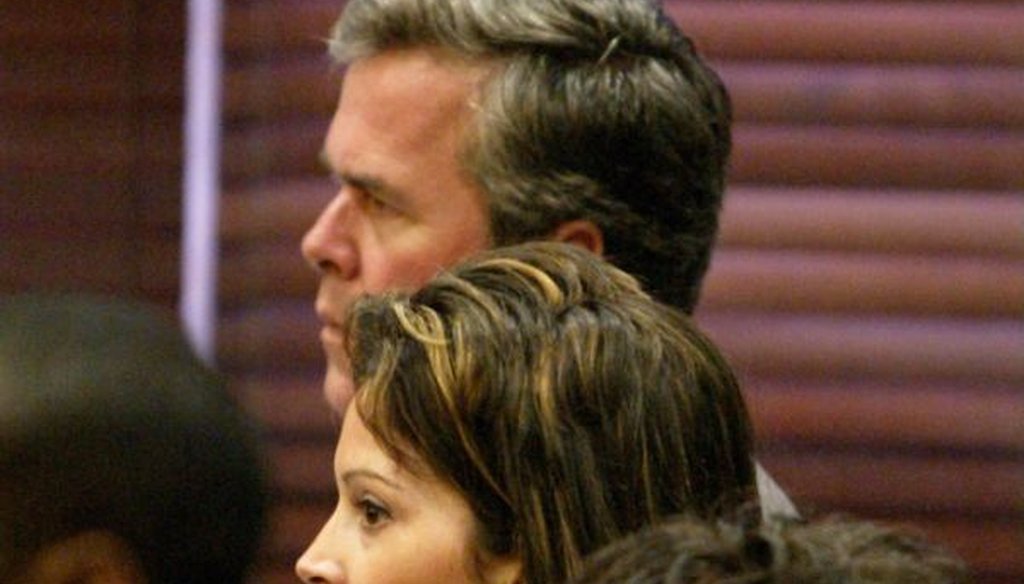 Noelle Bush, center, stands in front of her father, then-Florida Gov. Jeb Bush, during her final appearance in drug court on Aug. 8, 2003, in Orlando, Fla. (AP/Scott Audette)