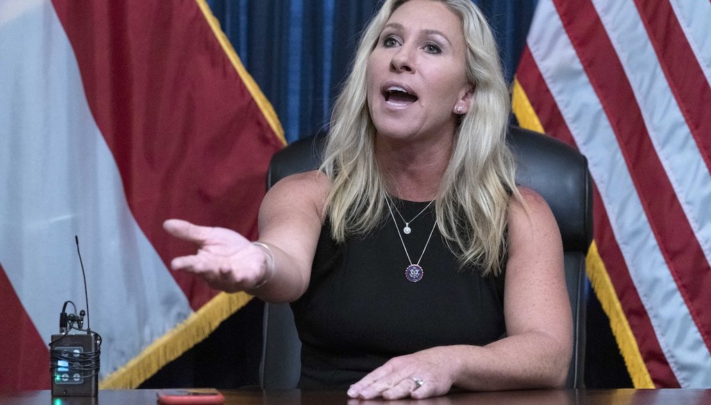 Rep. Marjorie Taylor Greene, R-Ga., talks to the media about her suspended Twitter accounts. (AP Photo/Jose Luis Magana)