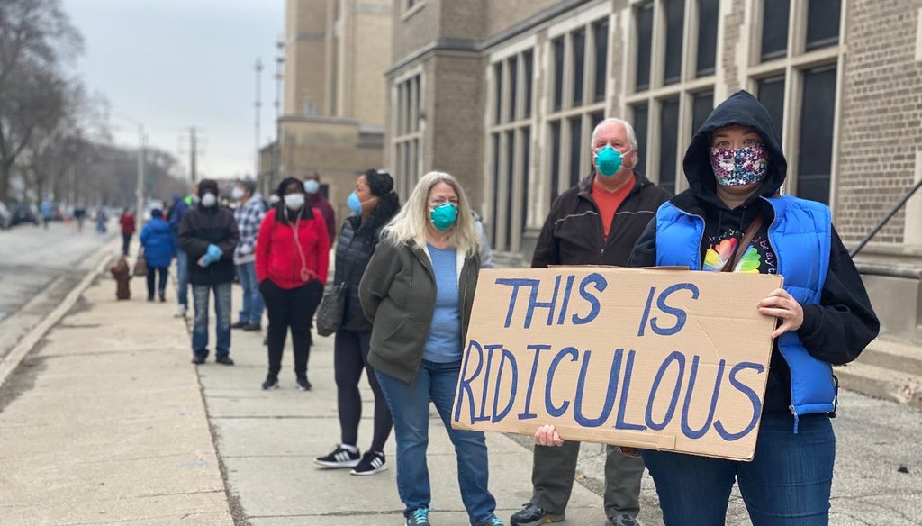 Milwaukee resident Jennifer Taff, who said she had been in a line for two hours, waited to vote at Washington High School in Milwaukee during the April 2020 primary. (Patricia McKnight/Milwaukee Journal Sentinel).