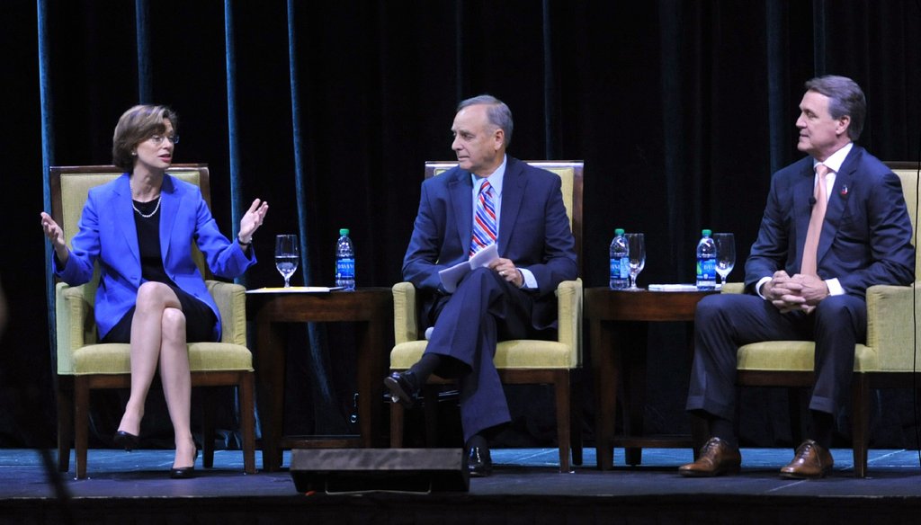 U.S. Senate candidates Michelle Nunn and David Perdue discuss their platforms in an August forum sponsored by the Georgia Chamber at the Marriott City Center in Macon. Photo by  AJC Photographer Kent D. Johnson.