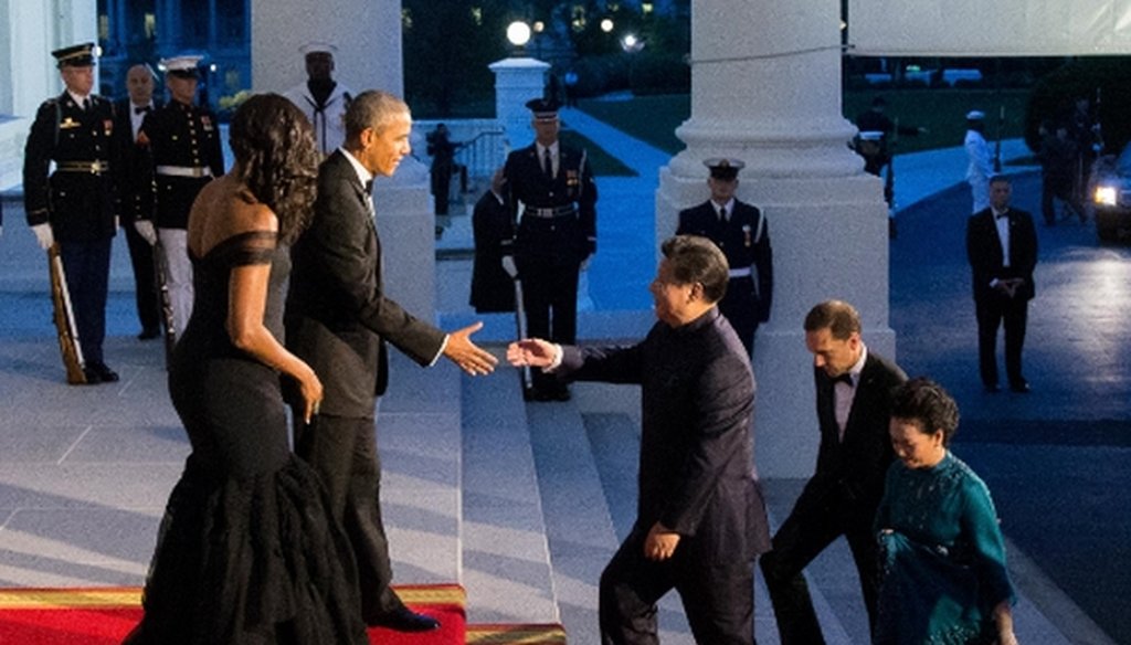 President Barack Obama and first lady Michelle Obama greet Chinese President Xi Jinping and his wife Peng Liyuan as they arrive for a State Dinner on Sept. 25, 2015, on the North Portico of the White House. (AP/Andrew Harnik) 