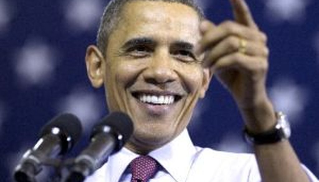 President Barack Obama gestures while speaking at Scranton High School in Scranton, Pa., on Nov. 30, 2011.