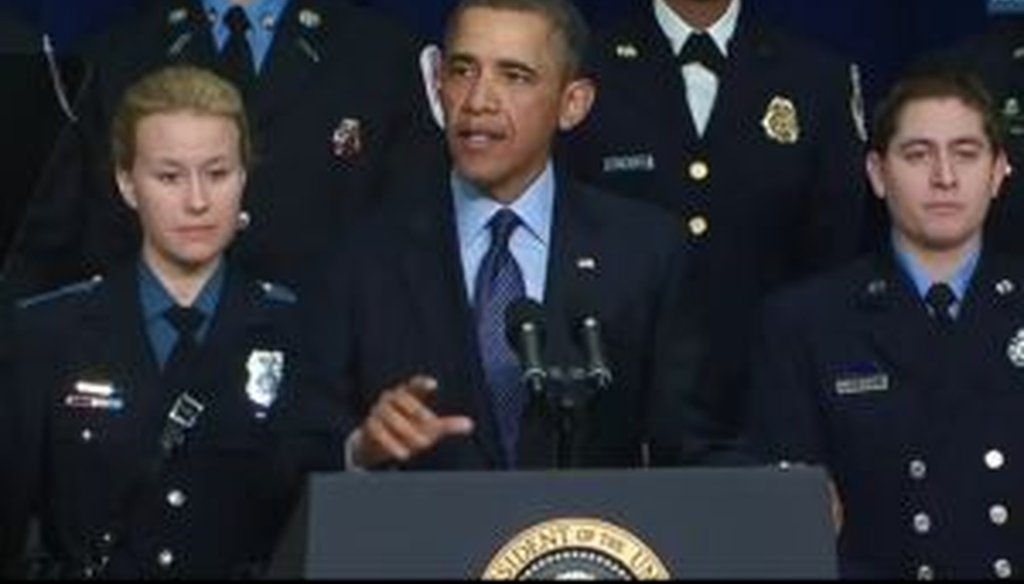 President Barack Obama, surrounded by uniformed law enforcement officers, outlined pitfalls of a budgetary sequester during a speech on Feb. 19, 2013.