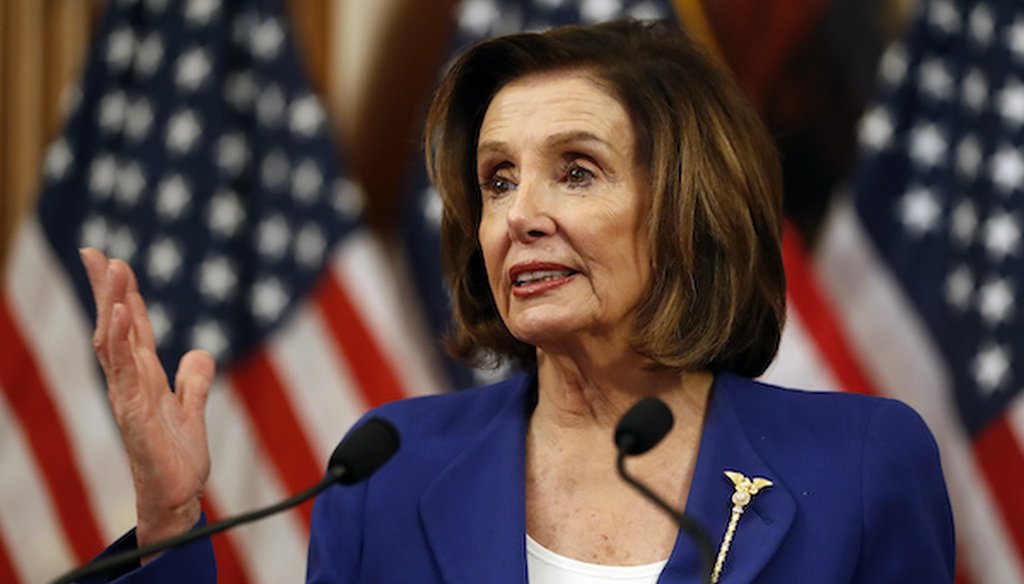 House Speaker Nancy Pelosi of Calif. speaks before she signs the Coronavirus Aid, Relief, and Economic Security (CARES) Act. (Associated Press)