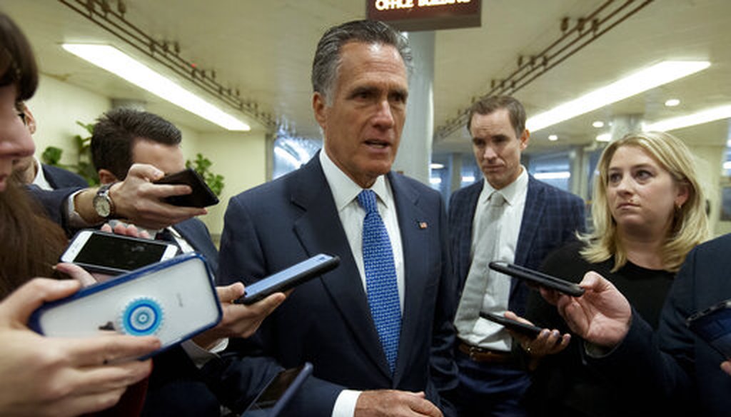 Sen. Mitt Romney, R-Utah, talks to reporters on his way to the Senate chamber on Capitol Hill in Washington, Tuesday, Jan. 21, 2020. (AP)