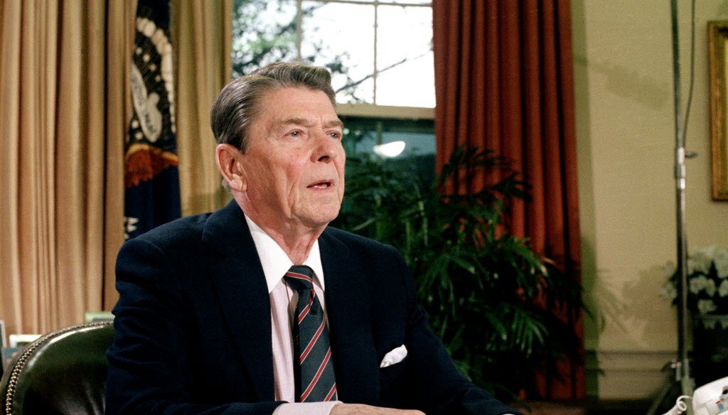 President Ronald Reagan, shown here in January 1986, signed landmark tax reform legislation in October 1986. Comparisons to that legislation are being made to tax bills now before Congress. (Associated Press)