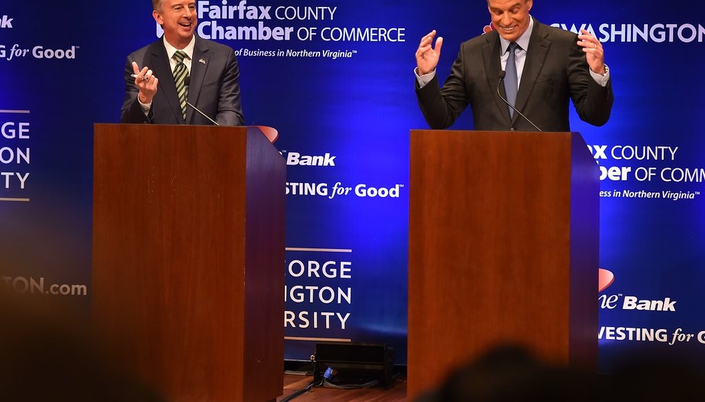 Democratic U.S. Sen. Mark Warner, right, gestures as his opponent Republican Ed Gillespie, answers a question during Tuesday evening's Virginia U.S. Senate Debate. AP Photo.