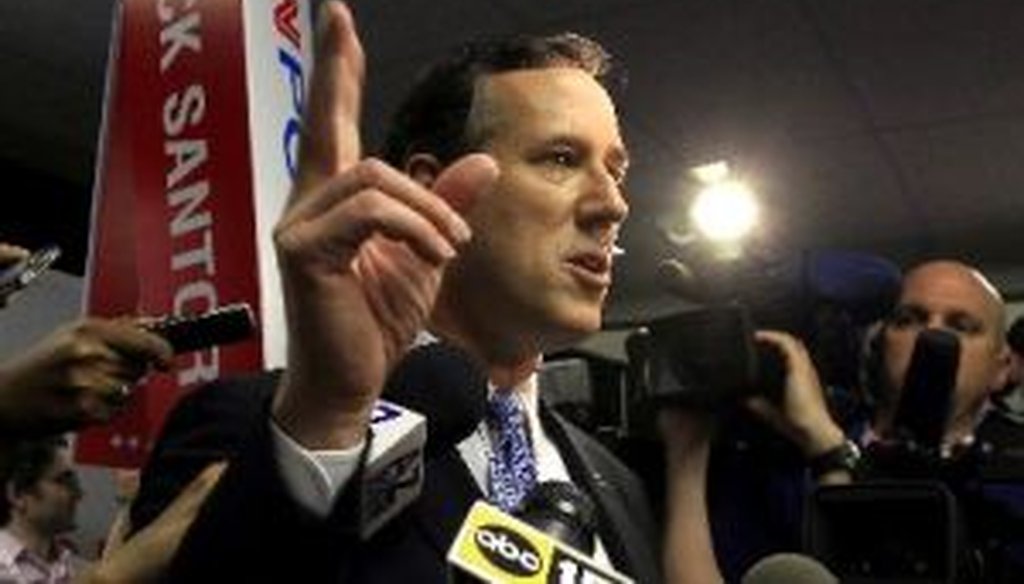 Rick Santorum talks to the media following a Republican presidential debate on Feb. 22, 2012, in Mesa, Ariz.