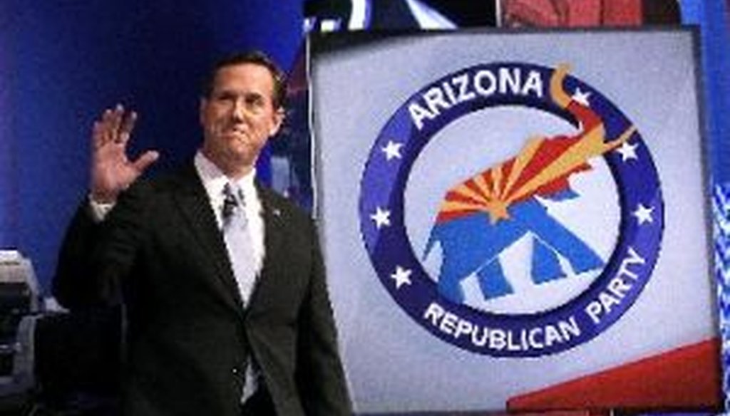 Rick Santorum waves to the crowd as he is introduced at the start of a Republican presidential debate on Feb. 22, 2012, in Mesa, Ariz.