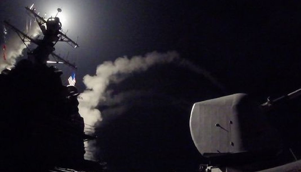 The guided-missile destroyer USS Porter (DDG 78) fires a tomahawk land attack missile from the Mediterranean Sea at a Syrian air base on April 6, 2017. (Photo by Communication Specialist 3rd Class Ford Williams, U.S. Navy, via Associated Press)