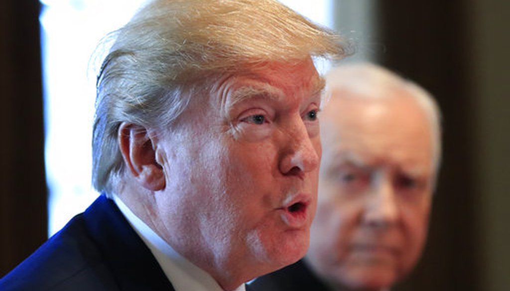 President Donald Trump, with Sen. Orrin Hatch, R-Utah, right, speaks during a bicameral meeting with lawmakers working on the tax cuts in the Cabinet Meeting Room of the White House in Washington, Wednesday, Dec. 13, 2017. (AP)