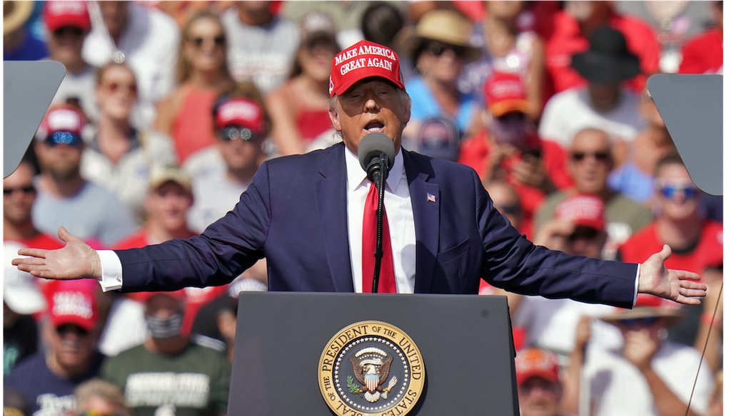 President Donald Trump gestures during a campaign rally in Tampa, Fla. (AP Photo/Chris O'Meara)