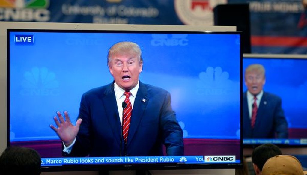 Republican presidential candidate Donald Trump is viewed on multiple televisions inside the spin room at the GOP presidential debate in Boulder, Colo., on Oct. 28, 2015. (Jeremy Papasso/Daily Camera via AP)