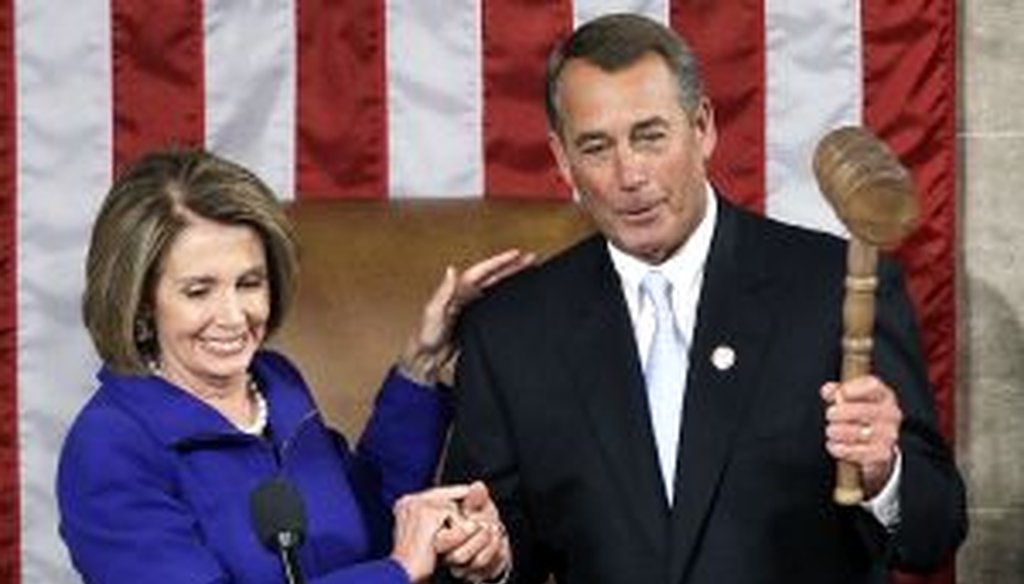 Rep. Nancy Pelosi turns over the gavel to the new House Speaker, Rep. John Boehner.