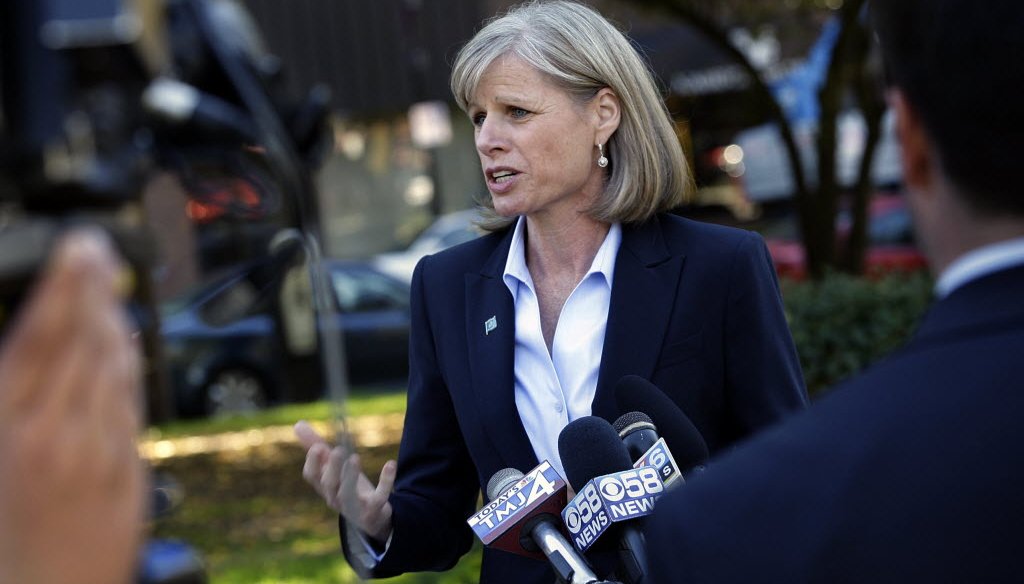 Gubernatorial candidate Mary Burke holds a press conference at Cathedral Square Park in Milwaukee on Tuesday, Oct. 8, 2013. MJS photo Angela Peterson