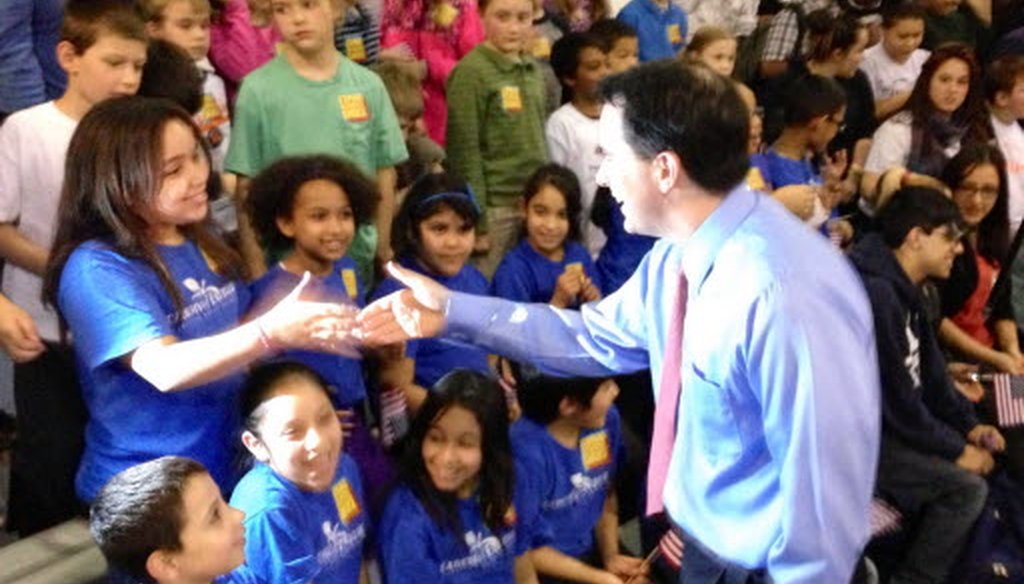 Gov. Scott Walker shook students' hands at La Casa de Esperanza in Waukesha on April 25, 2013