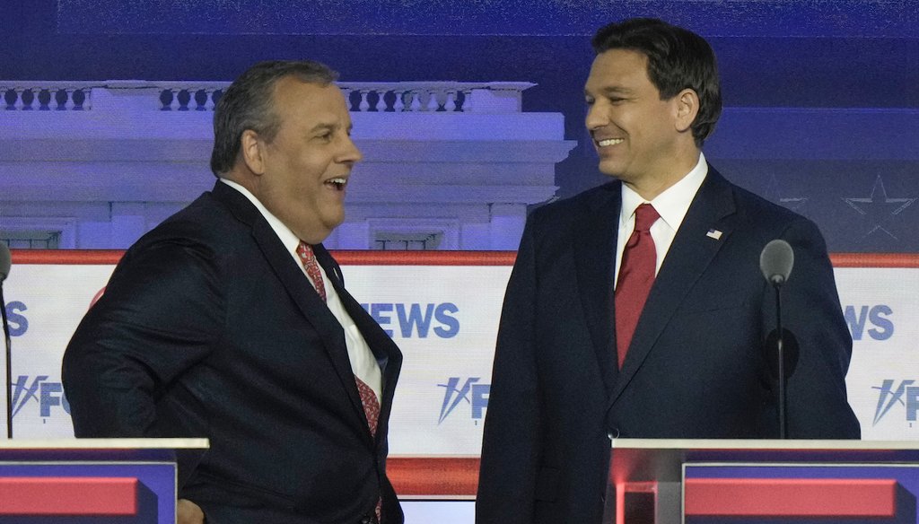 Former New Jersey Gov. Chris Christie talks with Florida Gov. Ron DeSantis during a break in the Republican presidential primary debate Aug. 23, 2023, at Fiserv Forum in Milwaukee. (AP)