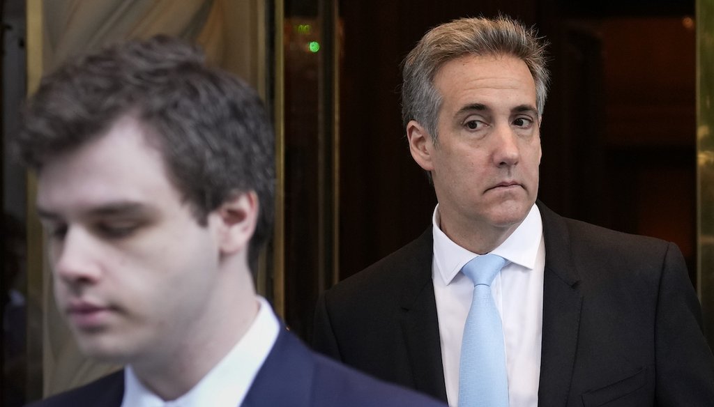 Michael Cohen, right, leaves his apartment building in New York May 14, 2024. Cohen is a key witness in former President Donald Trump's criminal trial. (AP Photo/Seth Wenig)