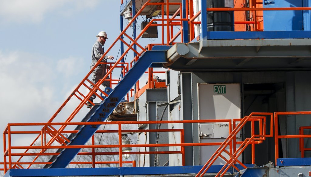 A worker on the drilling rig at a shale gas well drilling site in St. Mary's, Pa. (AP)